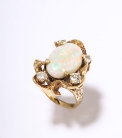 Opal Ring With Diamonds Set in Gold Modernist Mounting