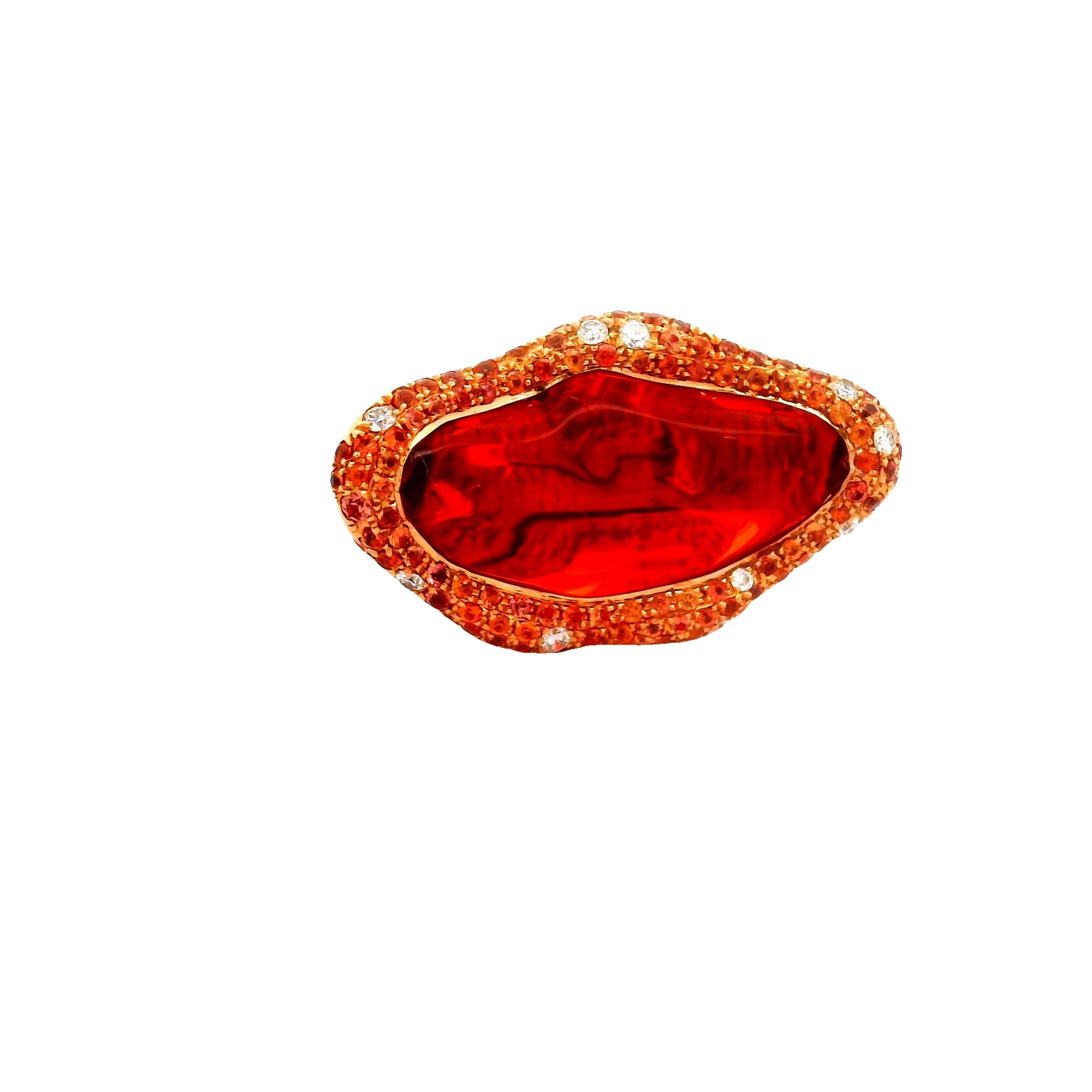 A striking fire opal, weighing 7.81 carats, is the focal point of this contemporary ring. The opal, cut in a brilliant shape, exhibits a vivid orange jelly color that is so clean which captivates the eye. Encircling the central stone are round-cut