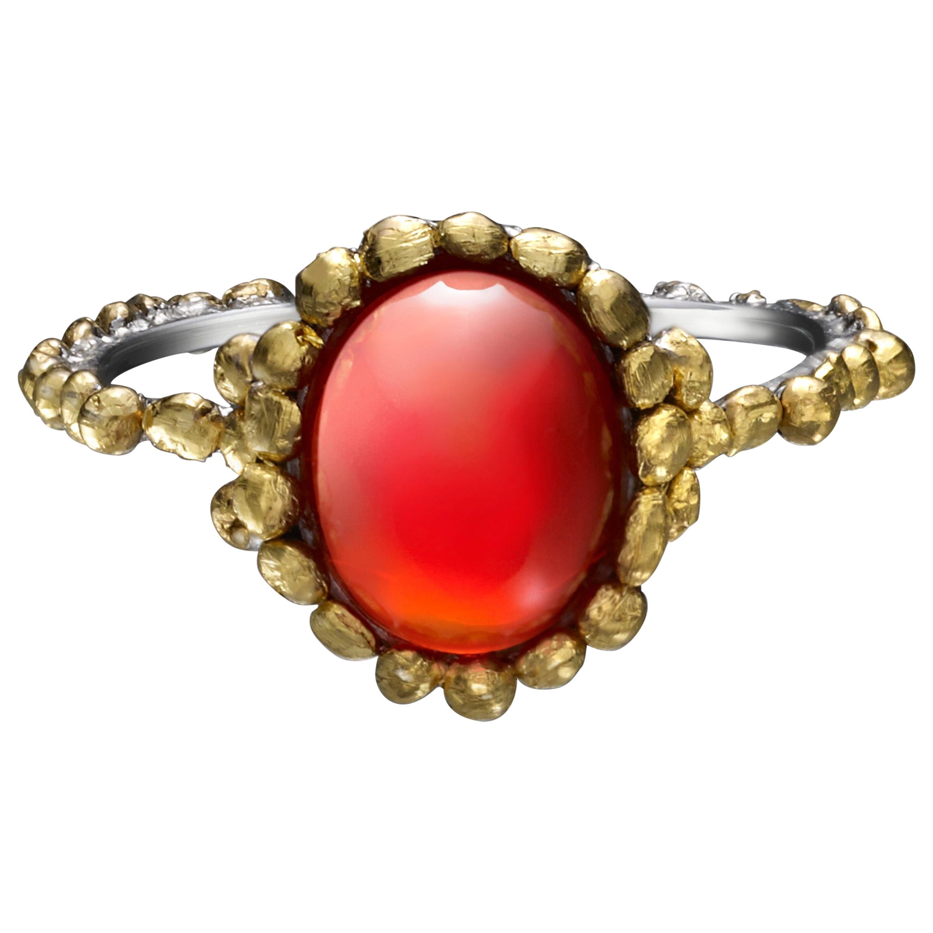 Oval Fire Opal Ring Made in Platinum and 24 Karat Gold For Sale