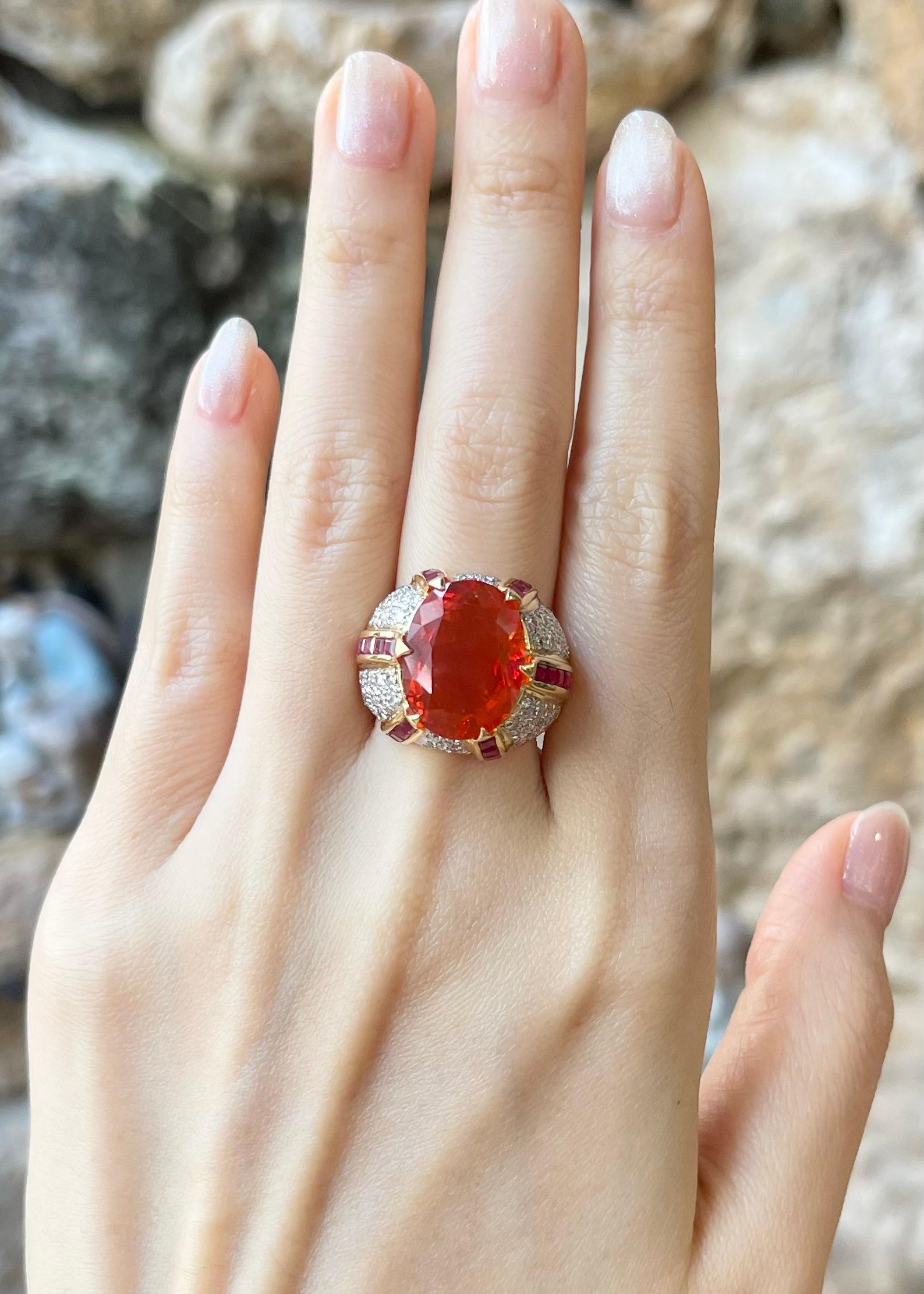 Fire Opal 7.44 carats, Ruby 1.0 carat and Diamond 0.75 carat Ring set in 14K Gold Settings

Width:  1.3 cm 
Length: 1.6 cm
Ring Size: 53
Total Weight: 18.56 grams

