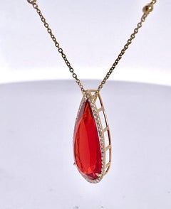 Fire Opal with Diamond surround 18K