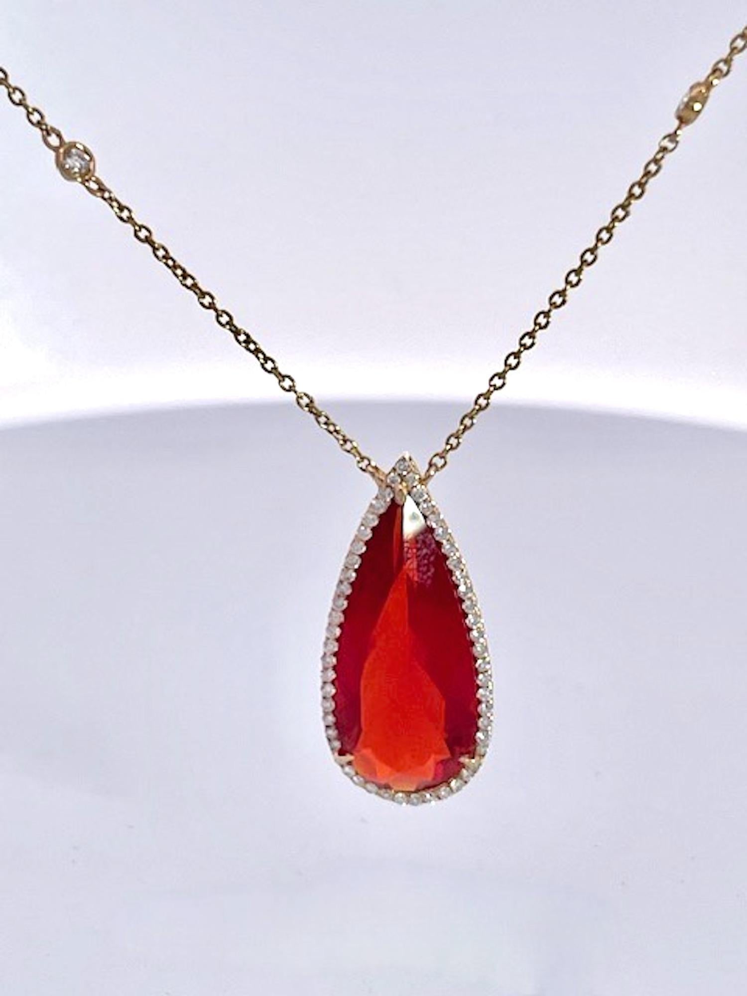 Contemporary Fire Opal with Diamond surround 18K For Sale
