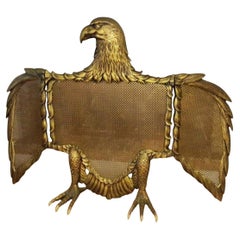 Pantalla contra incendios de bronce o latón con forma de águila, España, Siglo XX