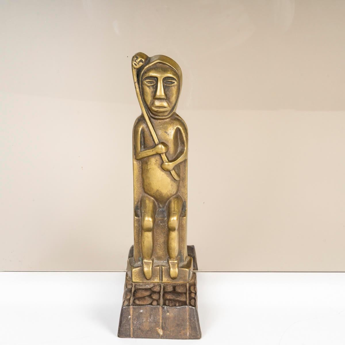 Fire screen in bronze and tinted glass plate, tribal art.

A tribal art bronze and tinted glass fire screen decorated with figures, 1960-1970.
H: 47cm, W: 70cm, D: 13cm