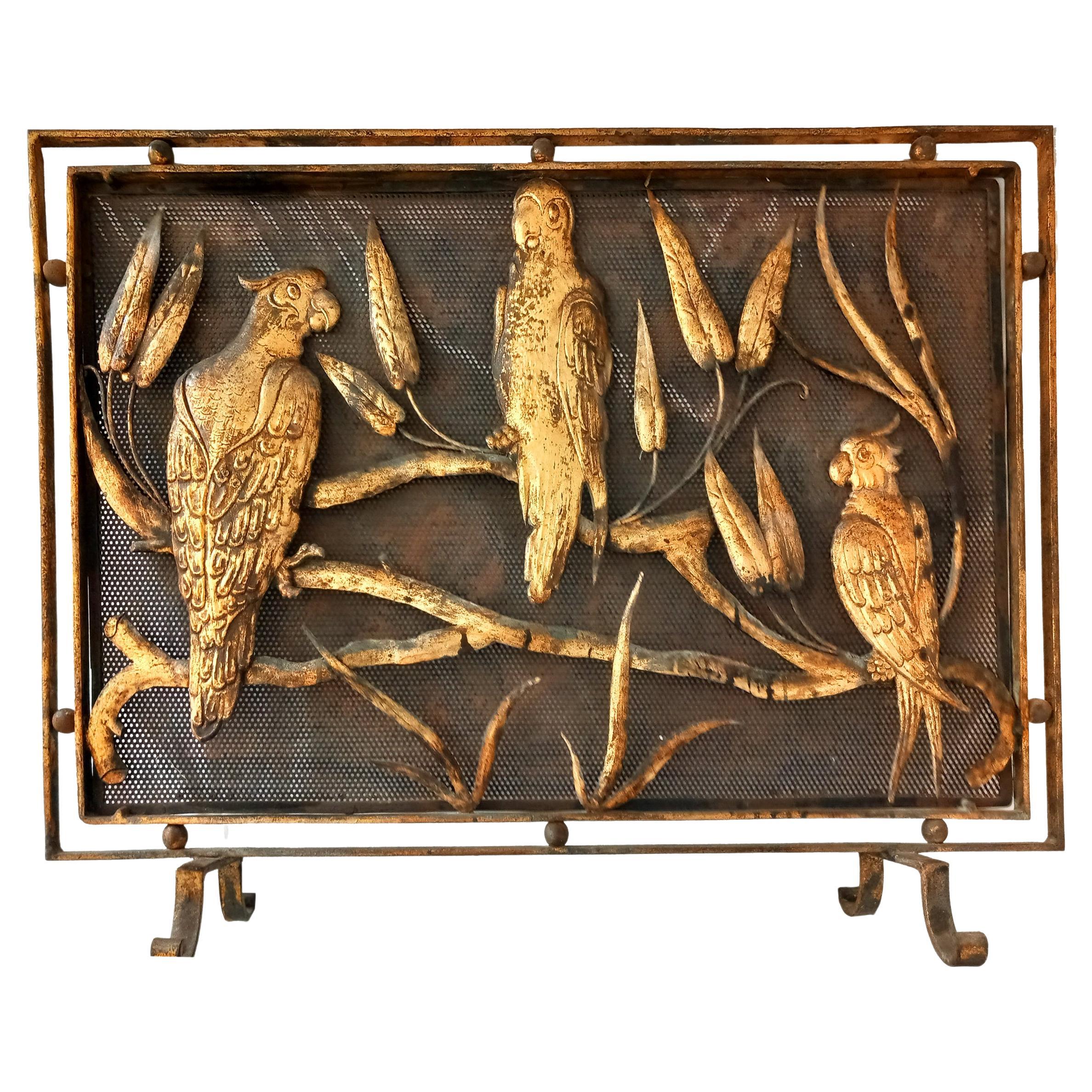 Panel fire screen iron forged with wild and jumgle  animals

When faced with a piece like this, one sometimes does not know what to say, it is even difficult to define it, in my case I like it so much that  I would say that I cannot stop looking at