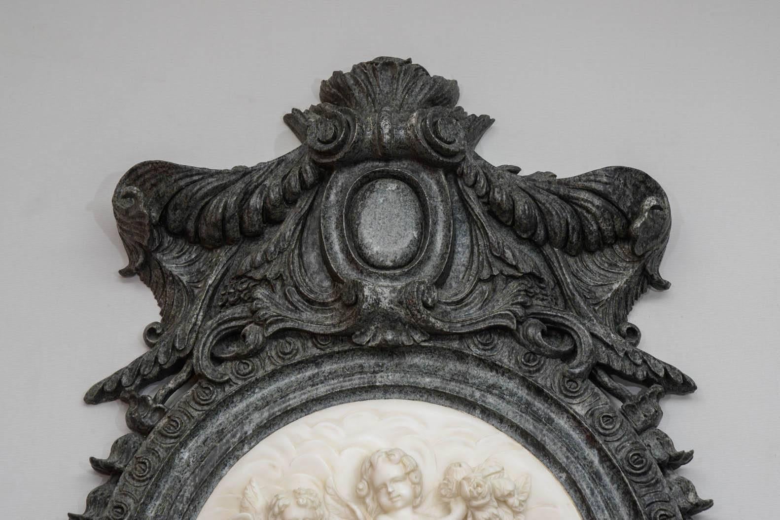 Fire-surround in marble, center medallion depicting lovers, style Napoleon III. Highly decorative.
  