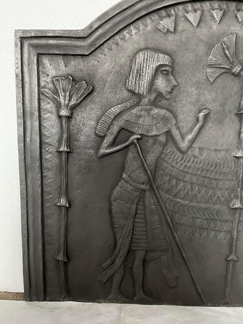 Art Deco Fireback Adorned with an Egyptian-Inspired Low-Relief For Sale