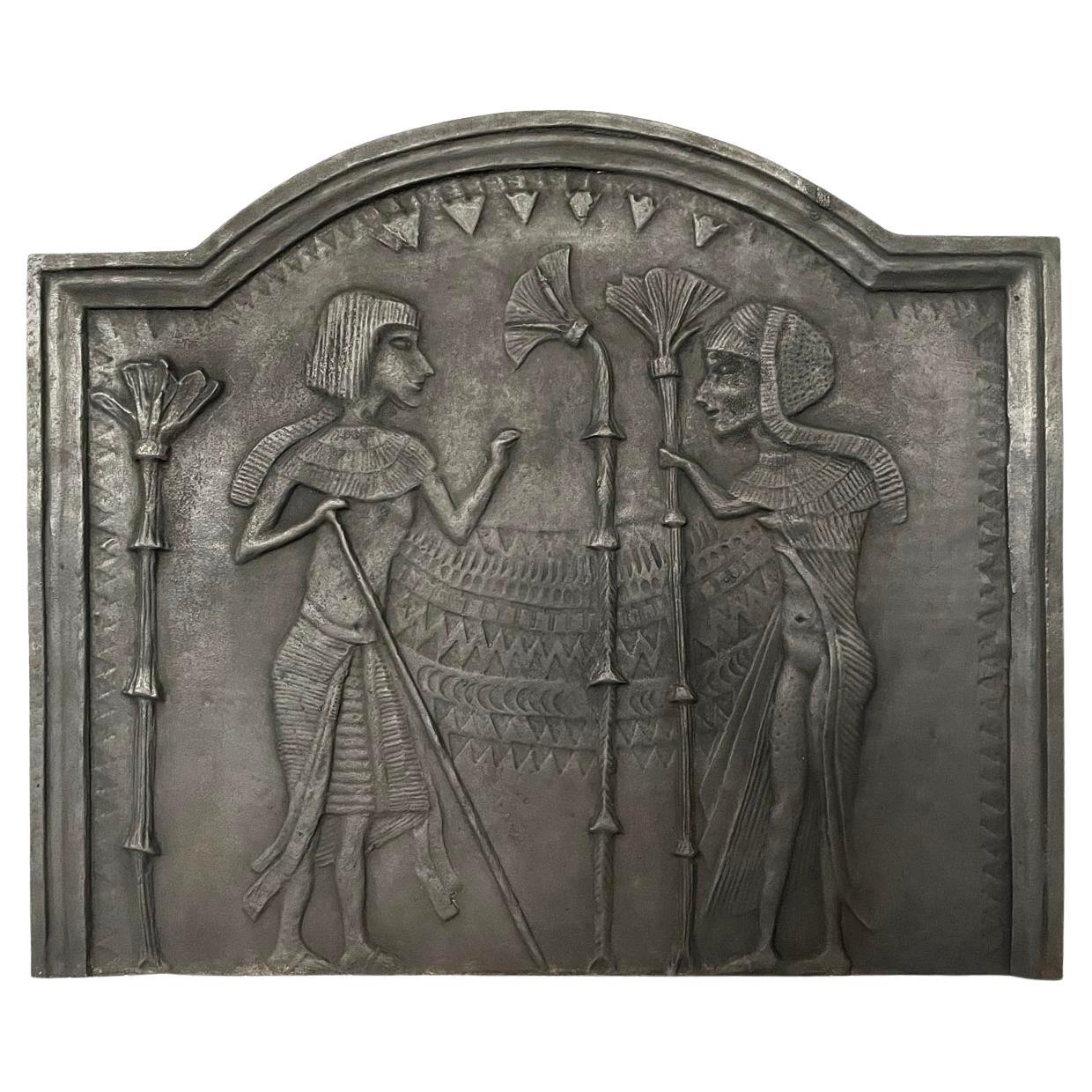 Fireback Adorned with an Egyptian-Inspired Low-Relief For Sale