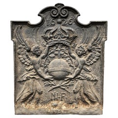 Fireback Dated 1626 Representing a Cruciferous Orb Framed by Two Angels