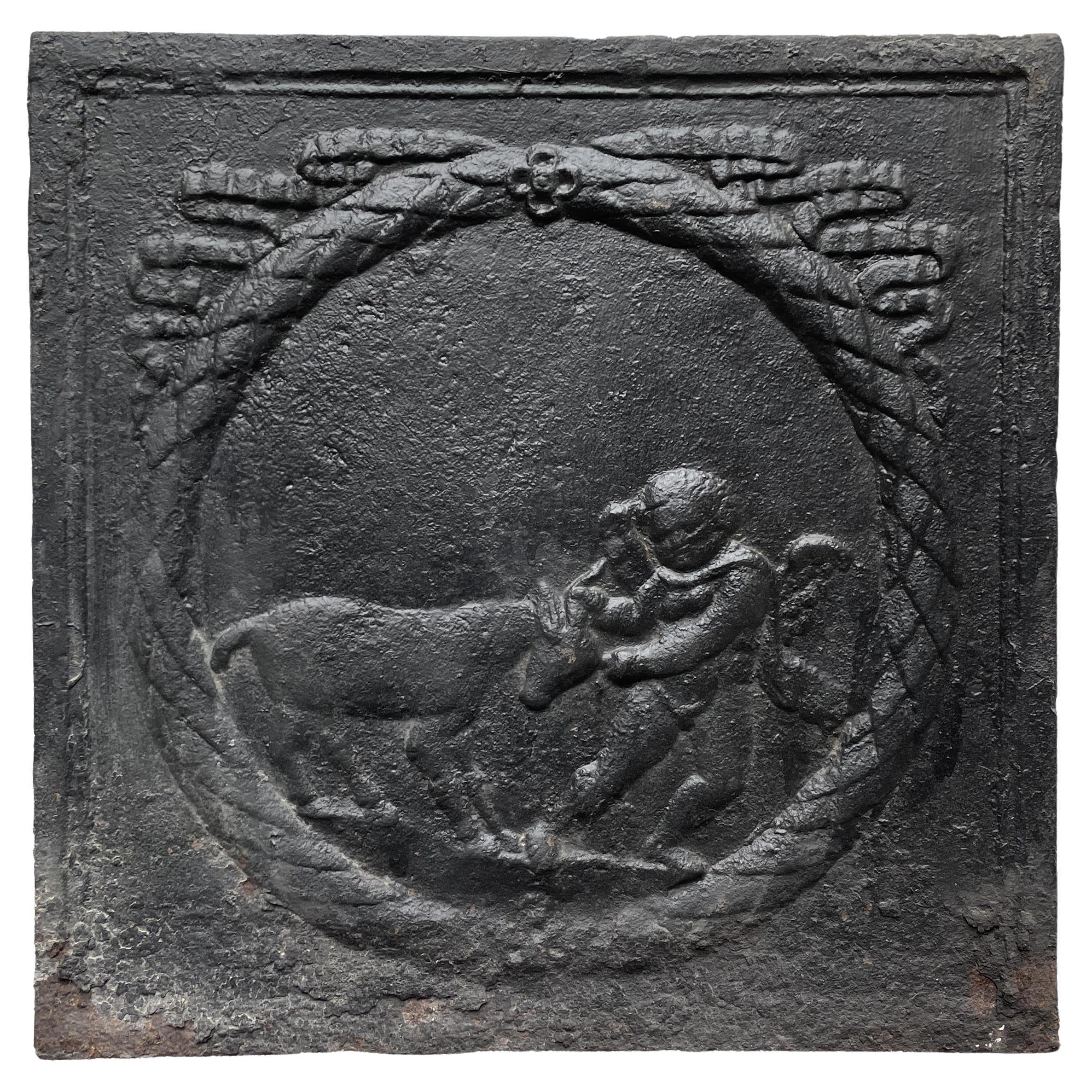 Fireback from the 18th Century Featuring a Love Playing with a Goat