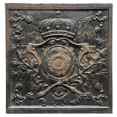 Antique Fireback from the 19th Century with a Shield Decorated with a Sunflower