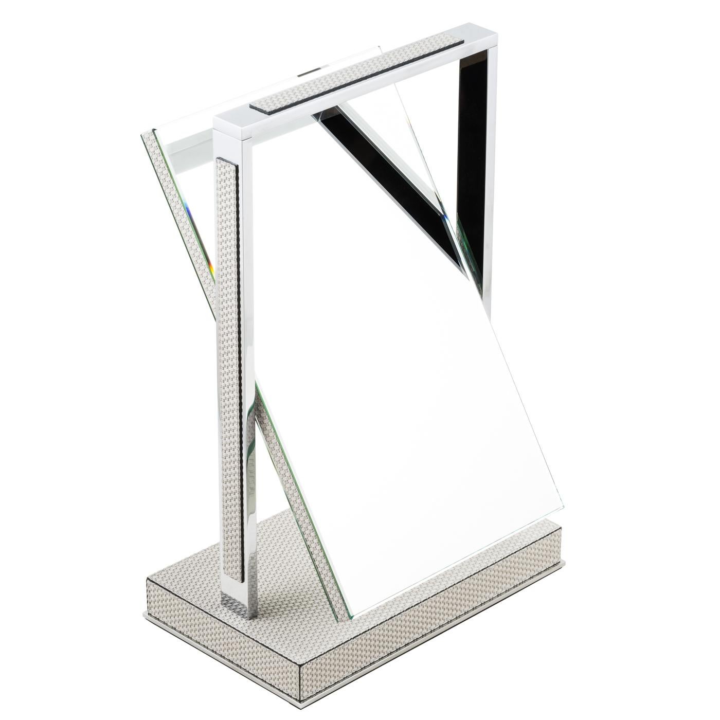 This unique piece is a striking example of a functional piece of decor. It is a freestanding mirror that can also be used as a decoration, thanks to its Minimalist lines and its fine leather cover. The wood vertical frame is fixed on a metal plinth,