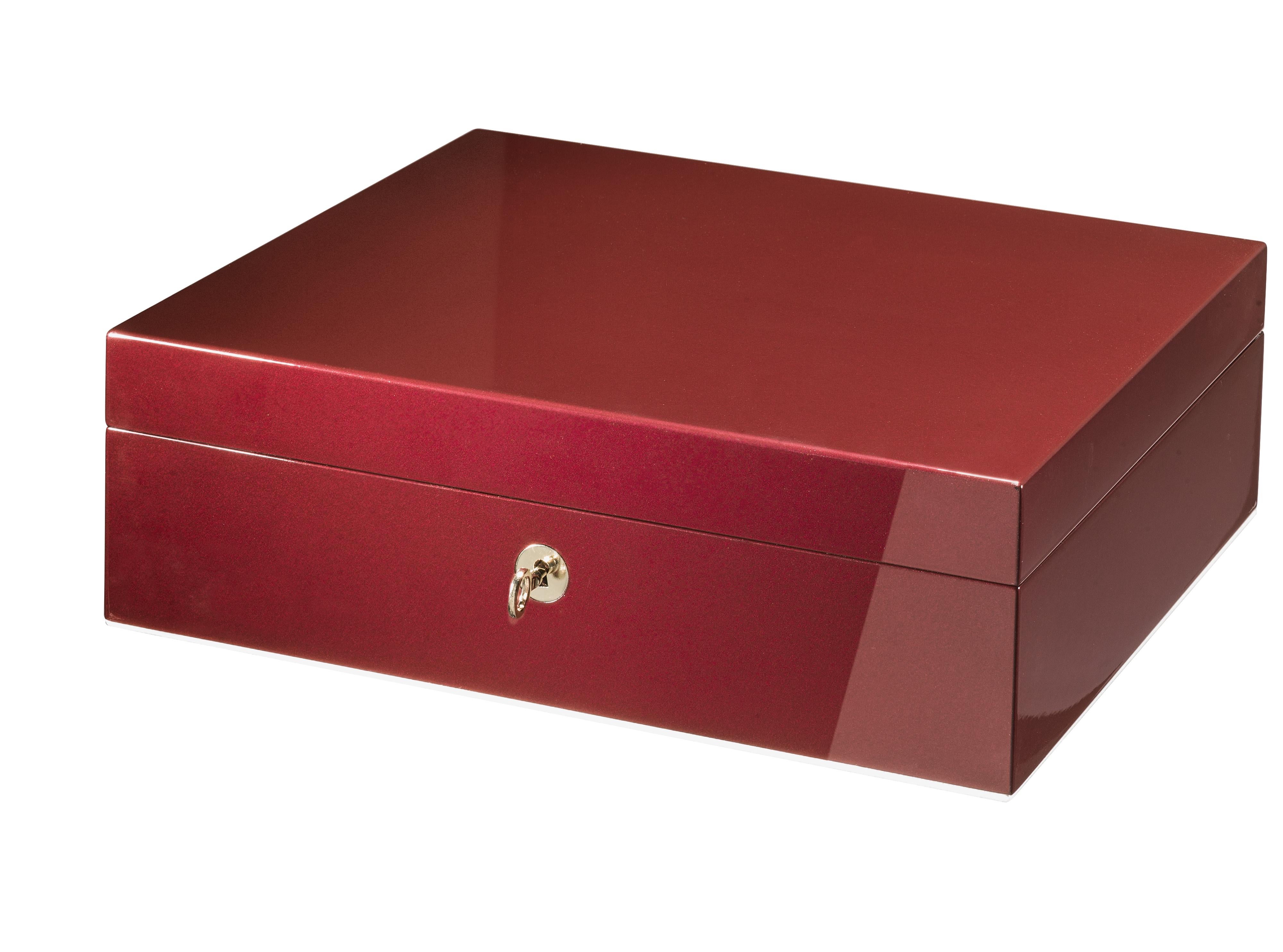 A clean and essential design of sophisticated contemporary flair, this jewelry box is distinguished by a superb ruby color obtained with a brushed and polished polyester finish. Handcrafted of wood, it is enriched with gold-finished metal details