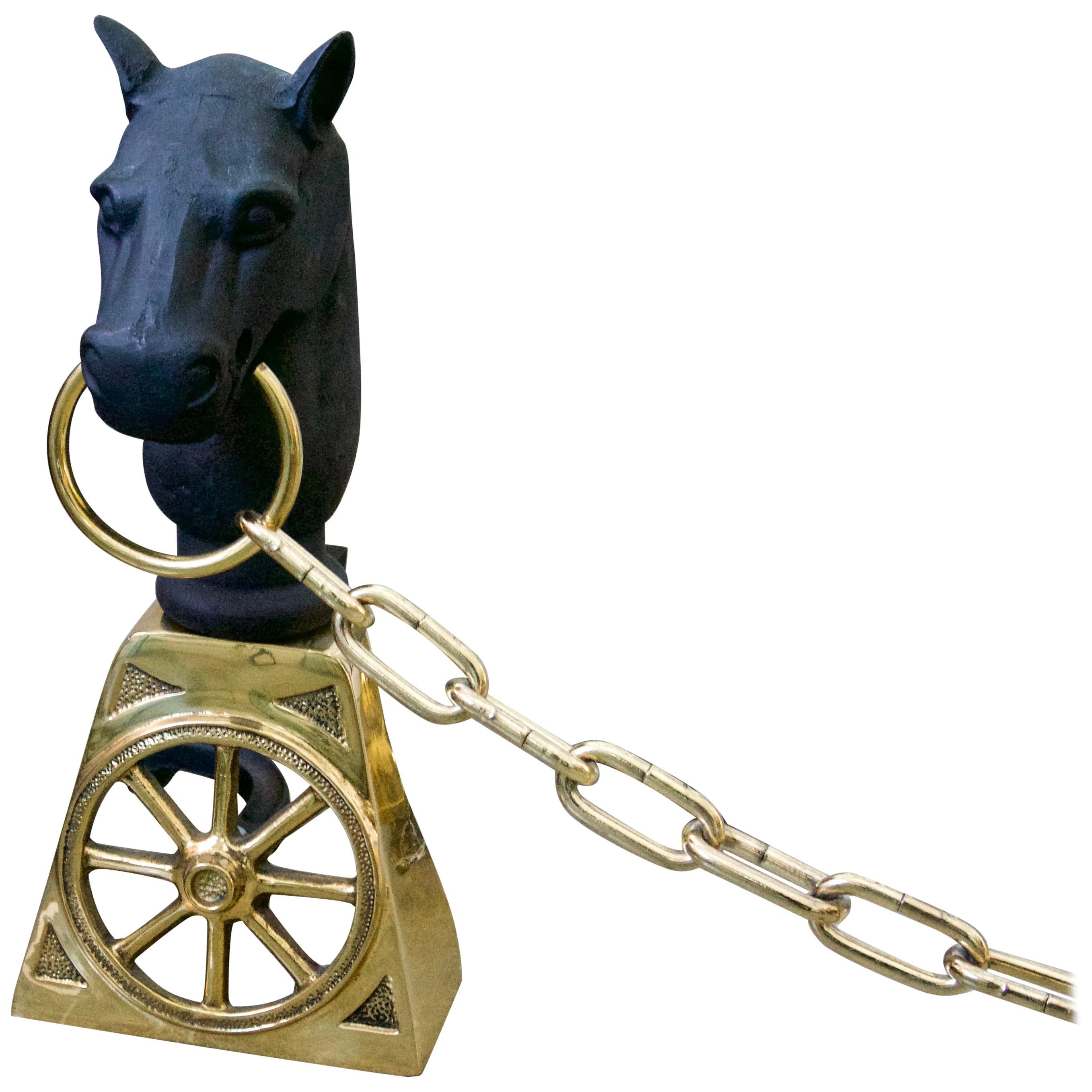 This stylish set of andirons will make the perfect addition to your cabin, horse farm or lake house with its equestrian motif of polished brass horse heads and chain.

The set has been professionally polished and lacquered so no tarnishing of the