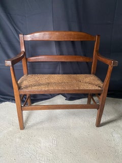 Fireplace bench dating from the 19th century straw seat