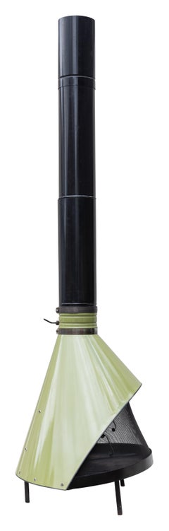 Fireplace freestanding by Preway, burns wood or gas, avocado color w/black pipe