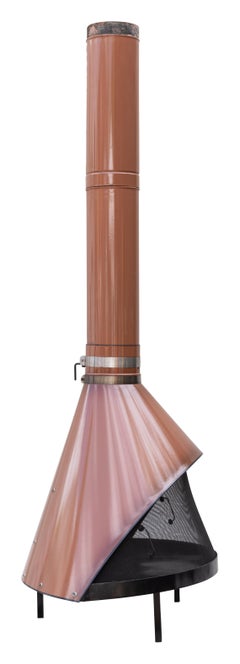 Fireplace freestanding by Preway, burns wood or gas, original copper brown color
