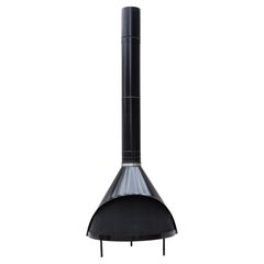 Fireplace freestanding by Preway, burns wood or gas, original gloss black color