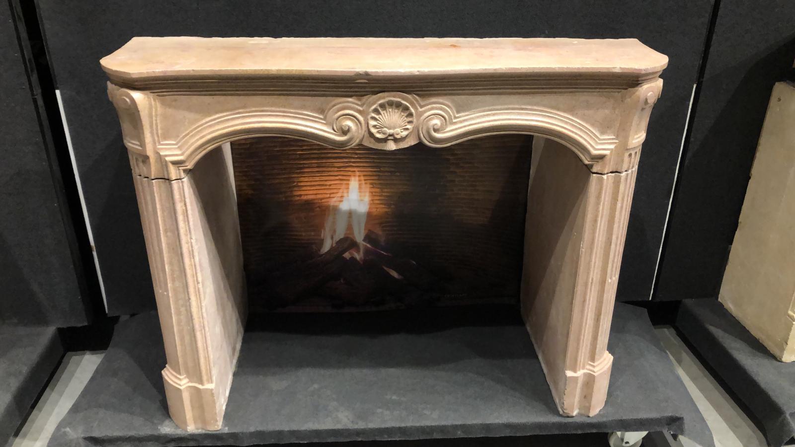 Beautiful colored marmer stone fireplace mantel with carving of exceptional quality. The stone has a warm, honey-colored hue and will look stunning in any room.

If you are looking for the perfect piece to complement your cozy interior, this