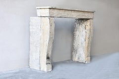 Cheminée en pierre calcaire française, de style campagnard, 19e siècle