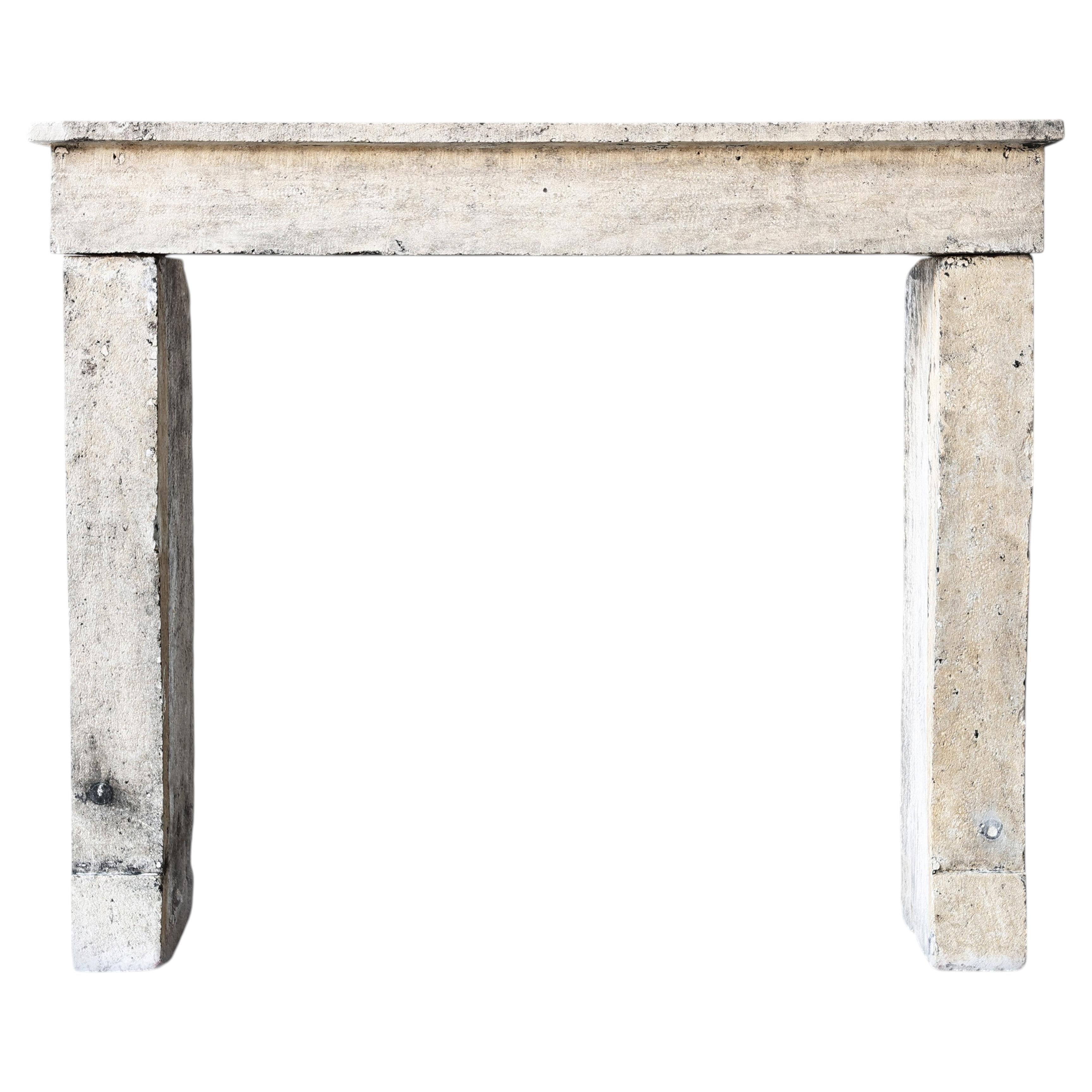 Fireplace mantel of French limestone, Campagnarde style, 19th century For Sale