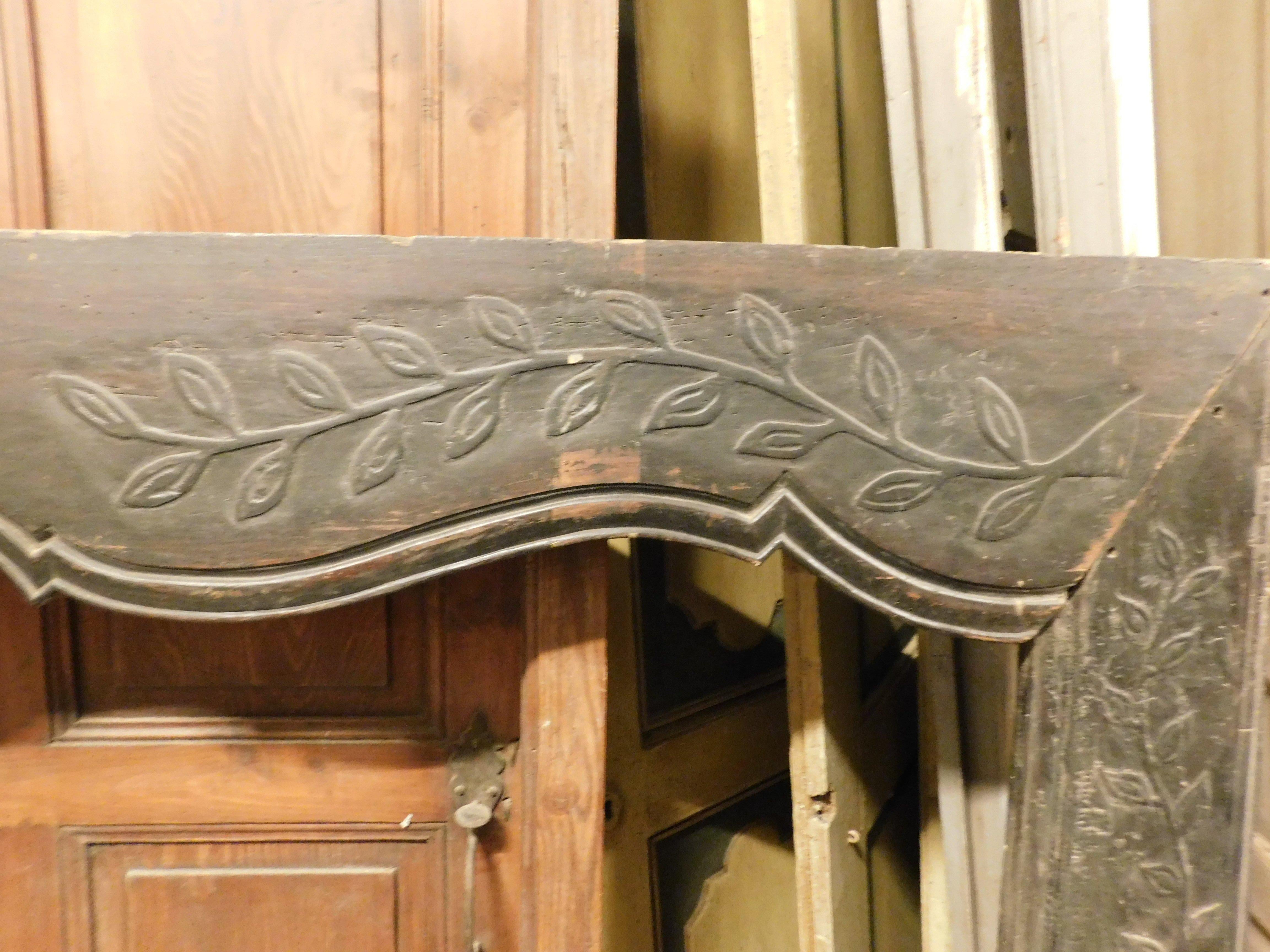 19th Century Fireplace mantle in black lacquered solid wood with floral carvings, Italy For Sale
