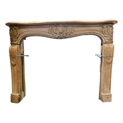 Fireplace mantle in carved Burgundy stone, France