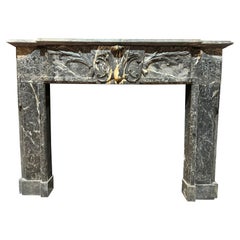 Fireplace mantle in fine gray marble with white veins, carved, Italy