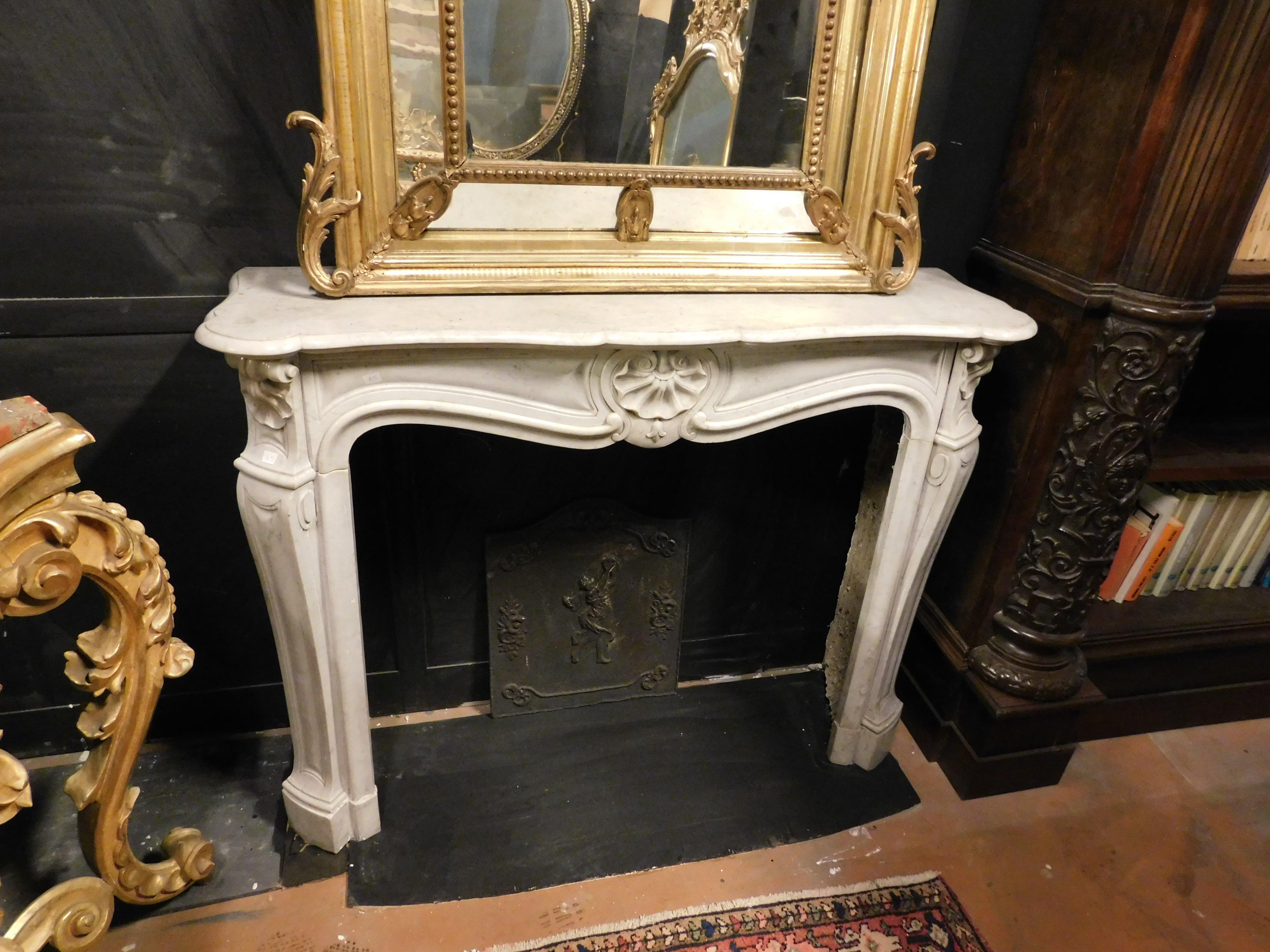 Hand-Carved Fireplace mantle in white Carrara marble, carved with a central shell, France
