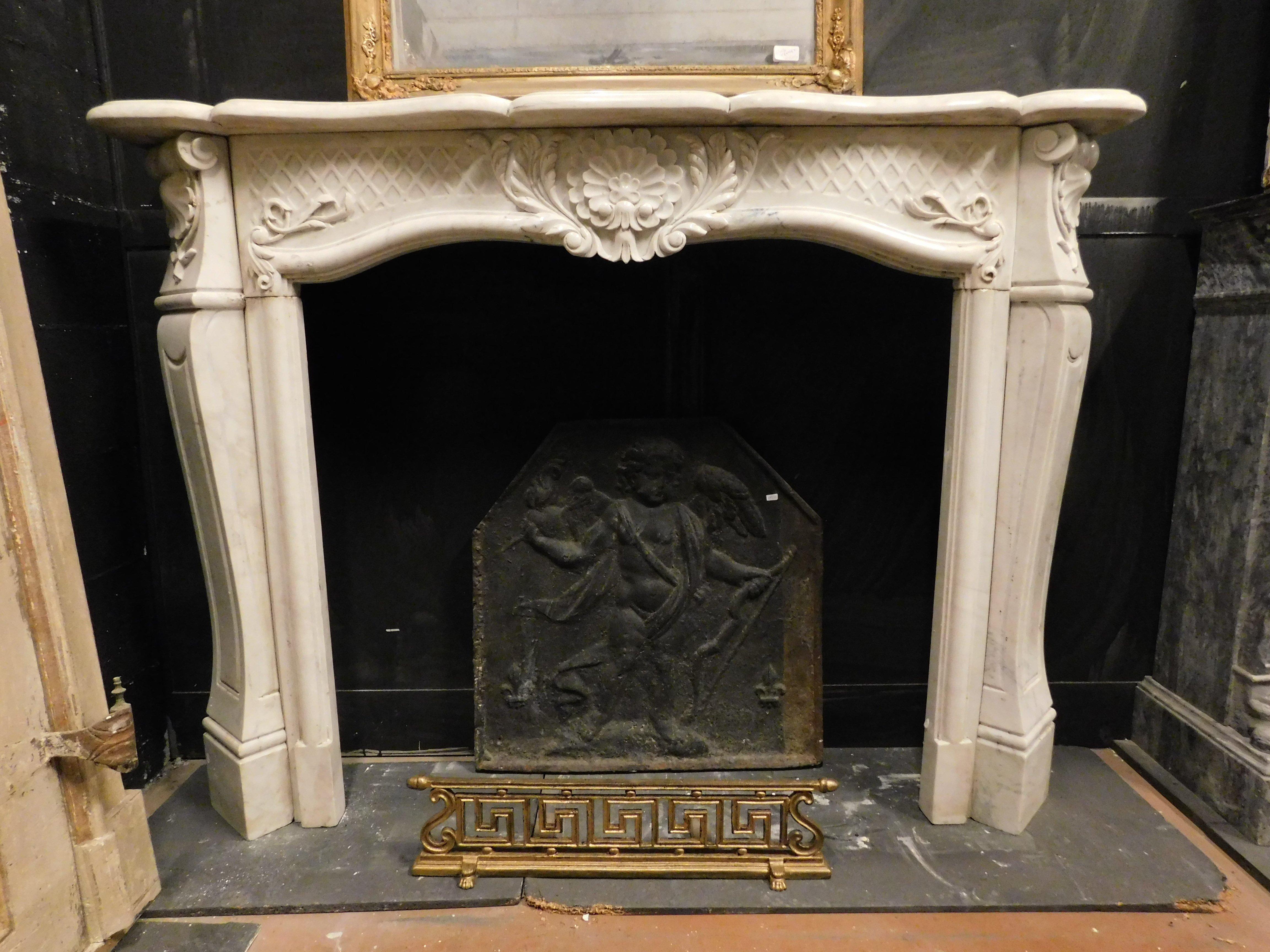 Italian Fireplace mantle in white Carrara marble, carved with floral decorations, Italy For Sale