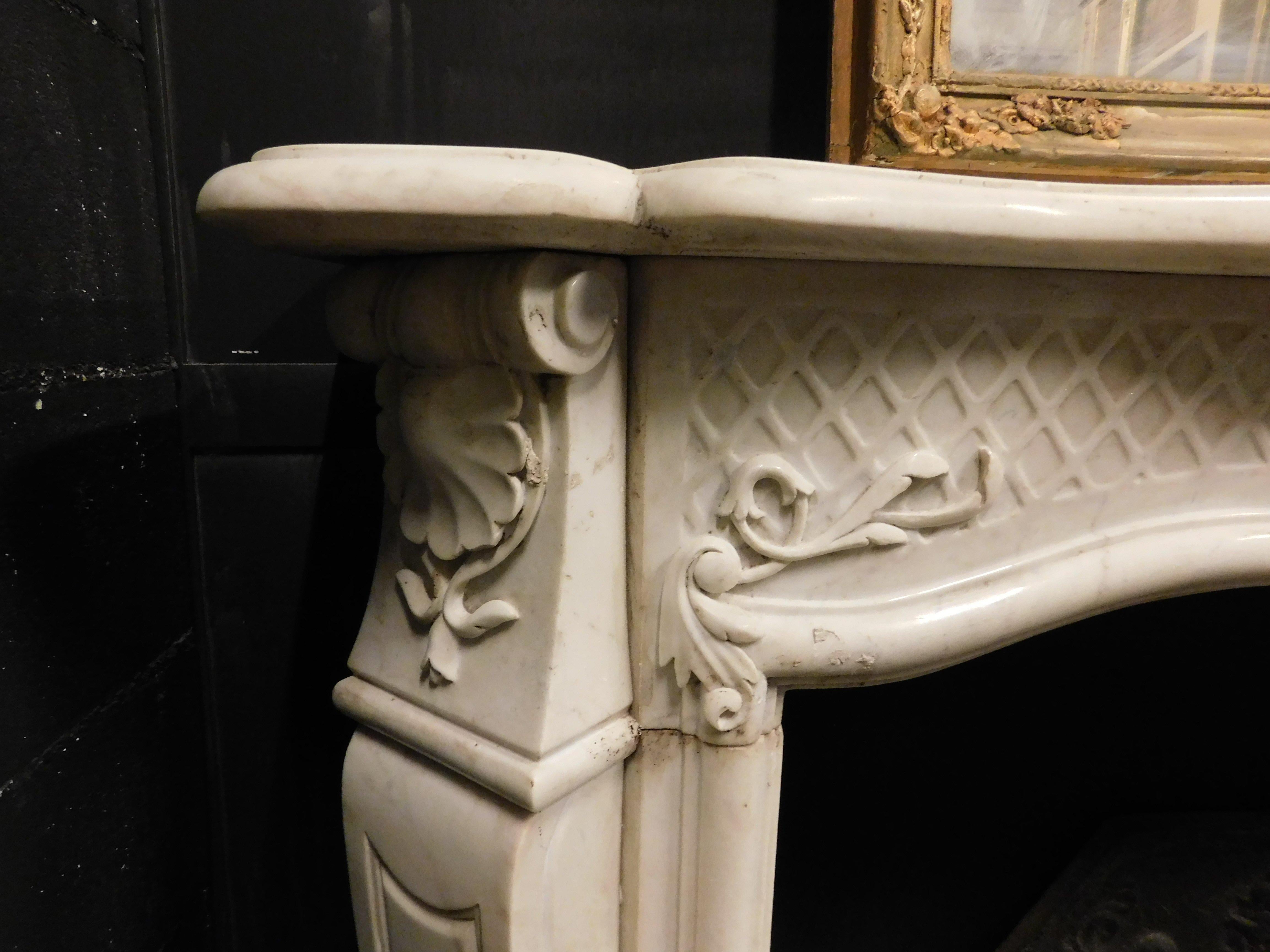 Carrara Marble Fireplace mantle in white Carrara marble, carved with floral decorations, Italy For Sale