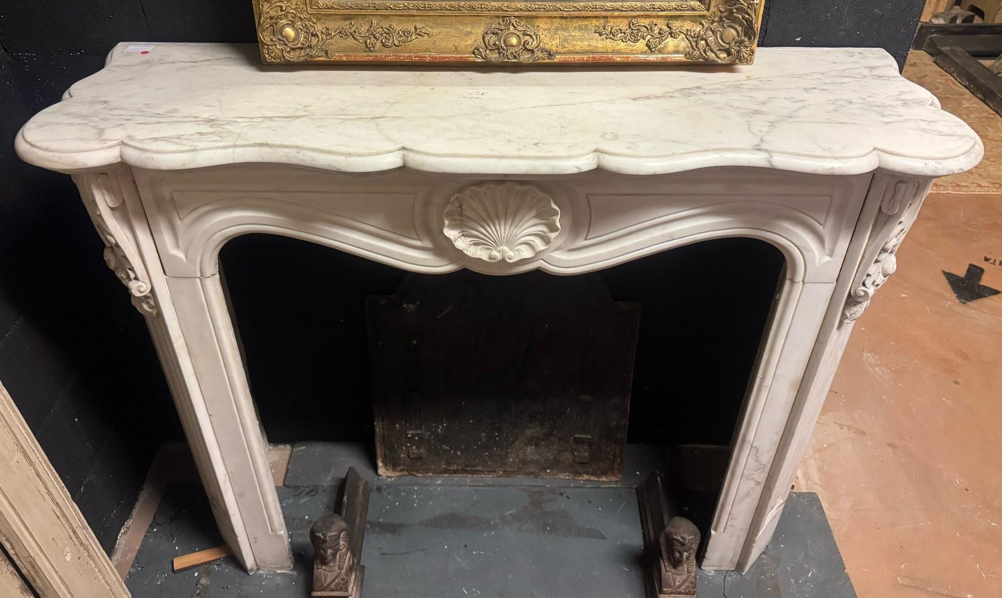 French Fireplace mantle in white Carrara marble carved with shell, France For Sale