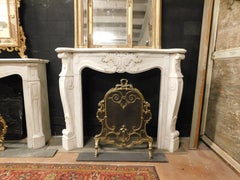 Fireplace mantle in white Carrara marble, carved with shell, Italy