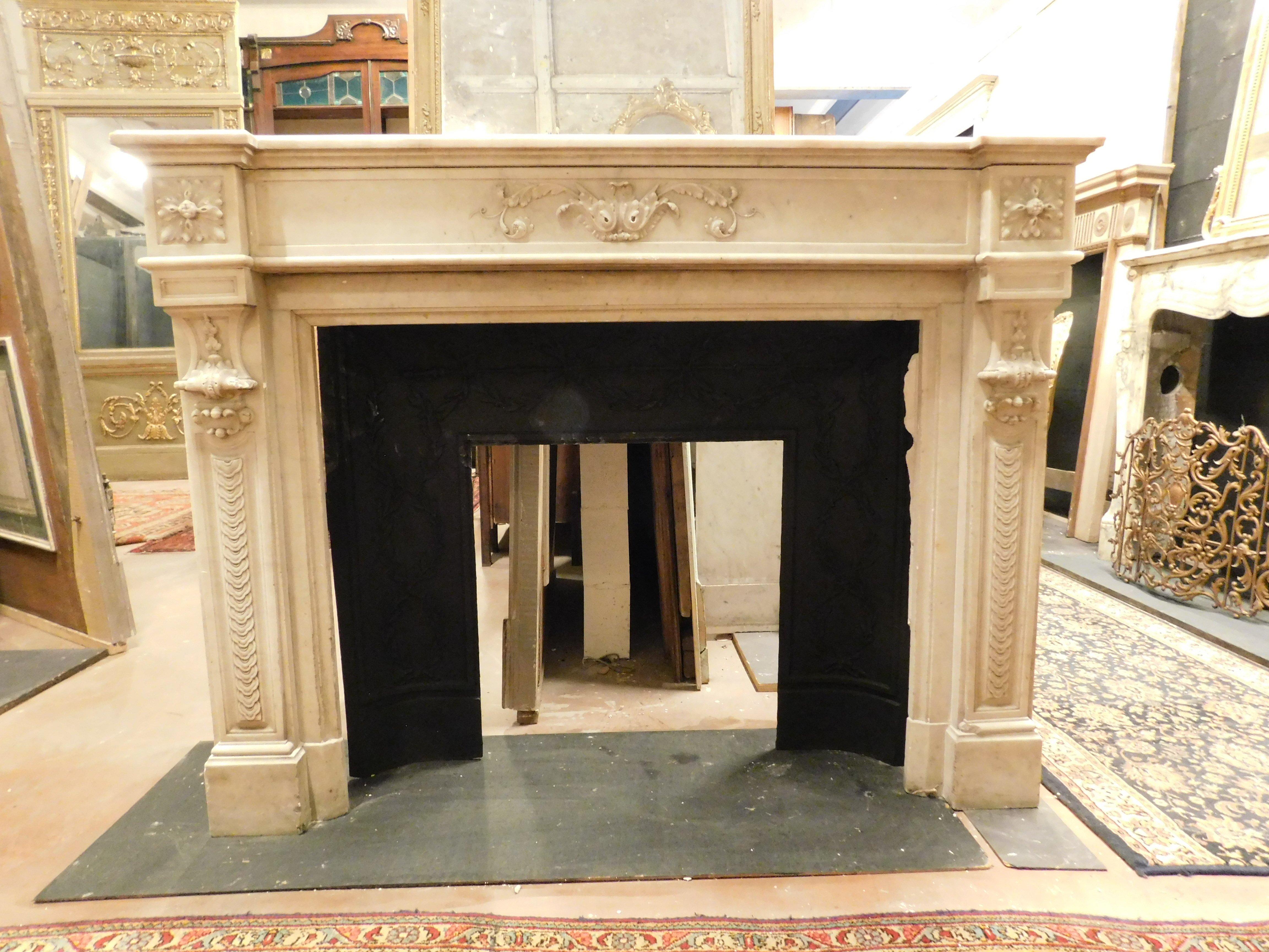 French Fireplace mantle in white Carrara marble with carved flowers, France For Sale