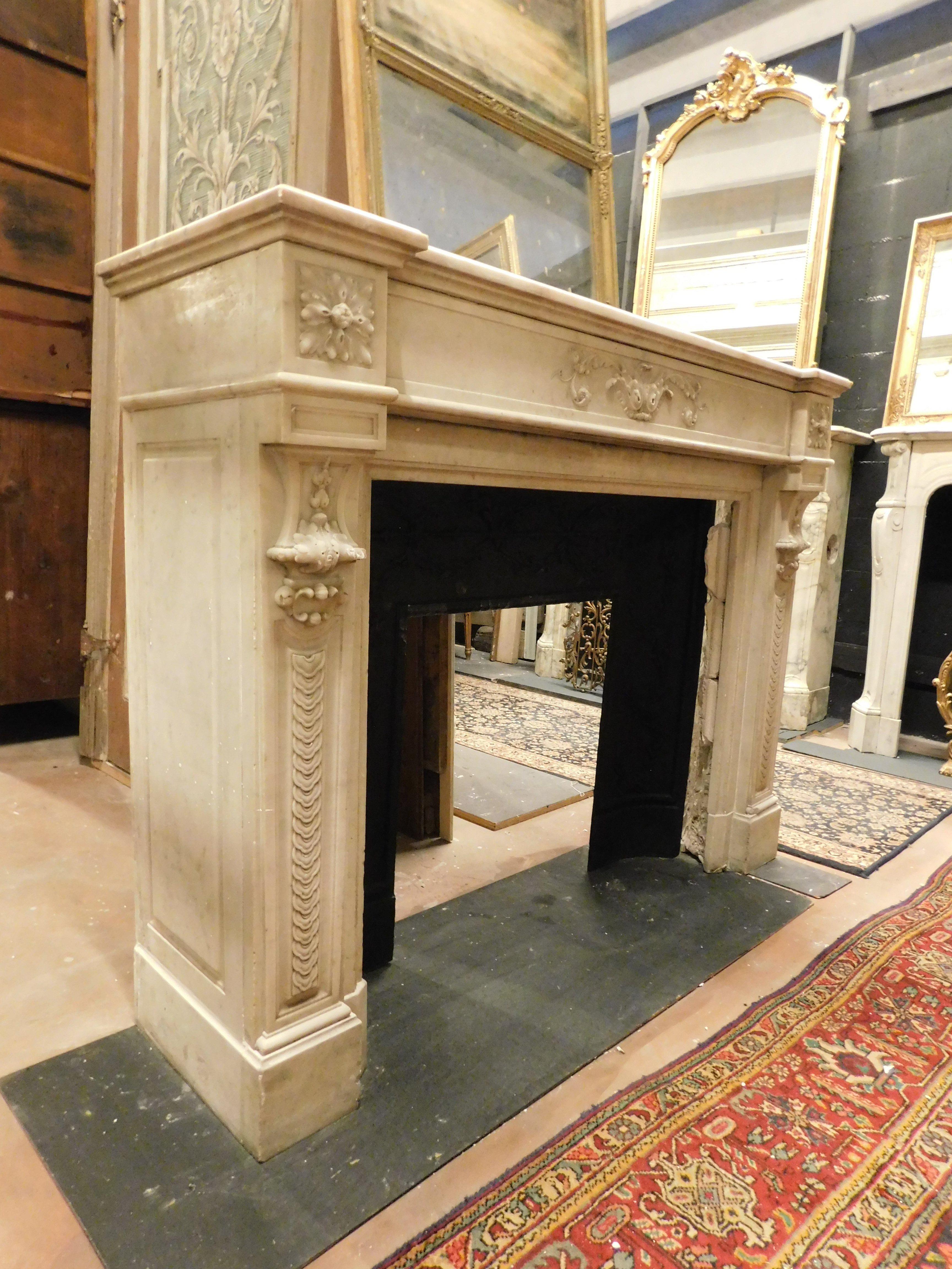 Hand-Carved Fireplace mantle in white Carrara marble with carved flowers, France For Sale