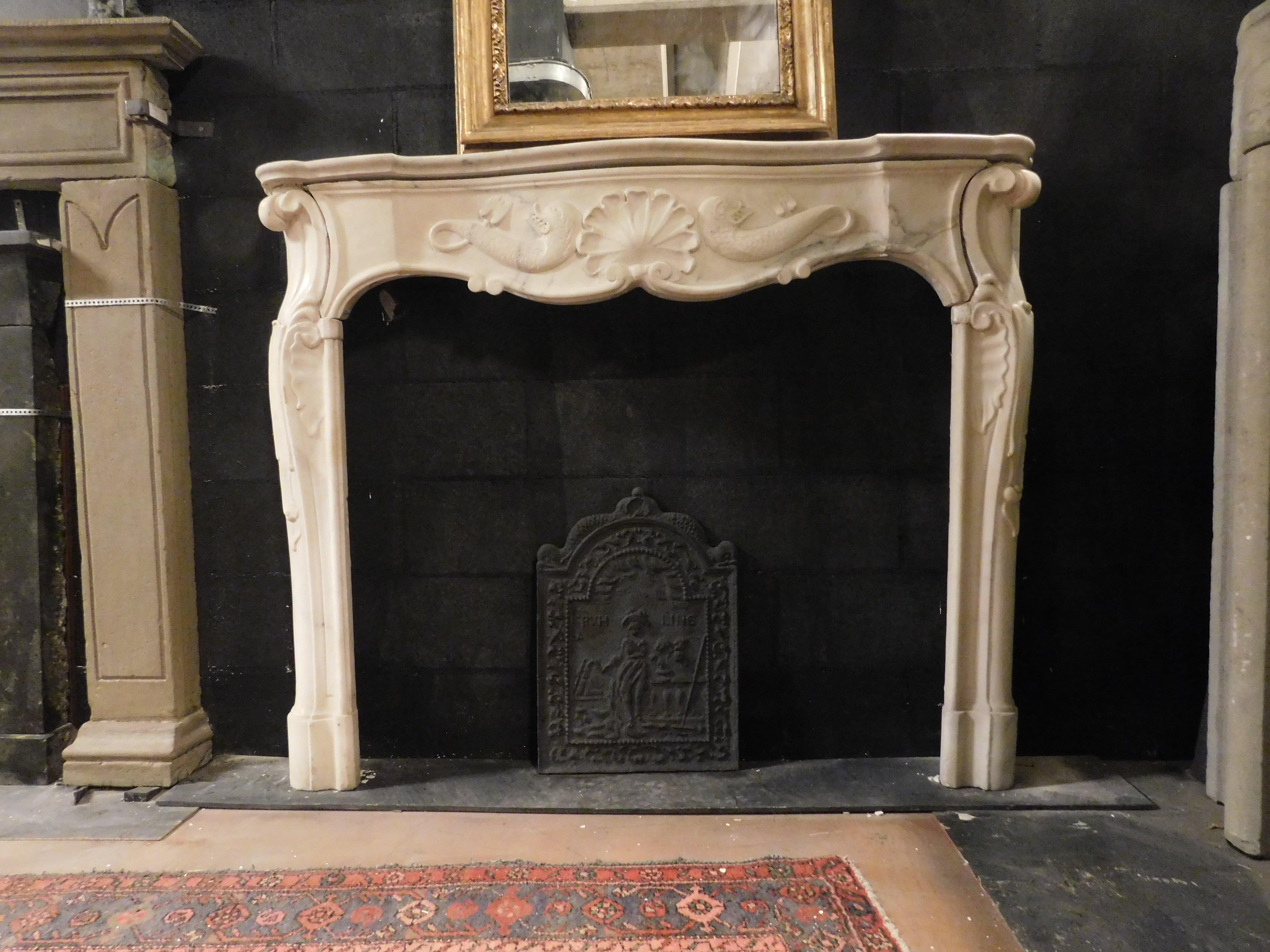 Hand-Carved Fireplace mantle in white marble, central shell and pair of triton, Genova Italy For Sale