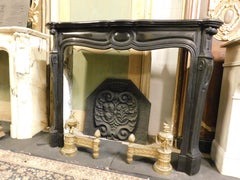 Fireplace mantle, Pompadour model carved in black marble, France