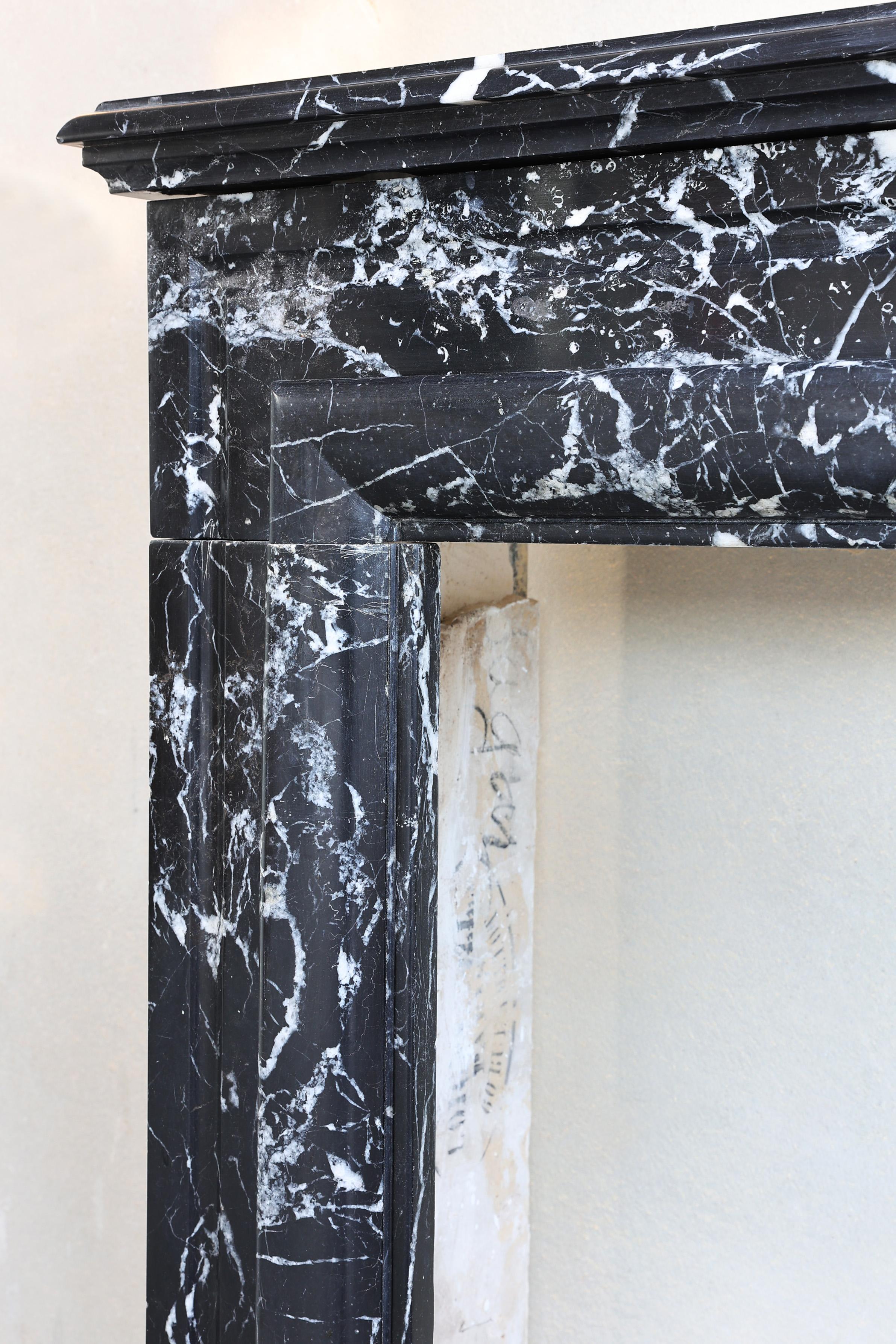 Fireplace of black Marquina marble in style of Louis XVI from the 19th century 1