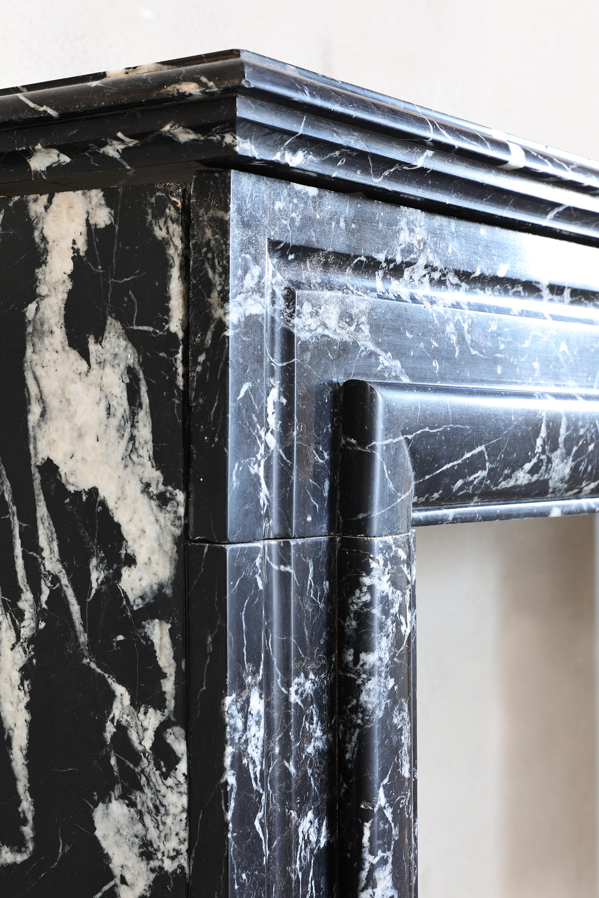 Fireplace of black Marquina marble in style of Louis XVI from the 19th century 2