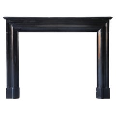 Cheminée ancienne en marbre  Noir De Mazy Marbre  19ème siècle