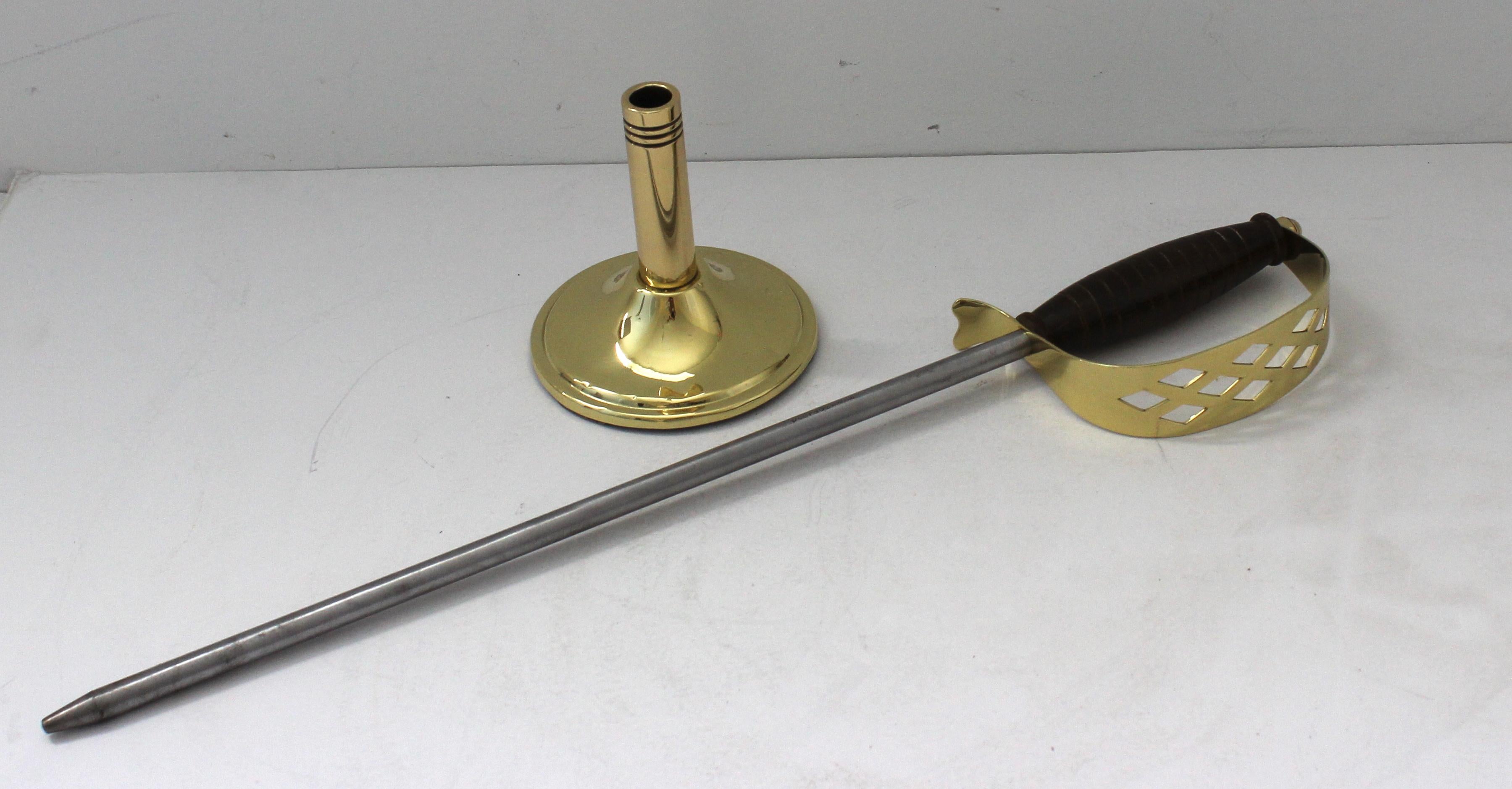 This stylish and chic English sword-form fireplace poker dates to the 1920s-1930s and was created by Peerage.

Note: The piece has been professionally polished and the brass also has a clear lacquer coat, so no tarnishing. 

Note: Marked Peerage
