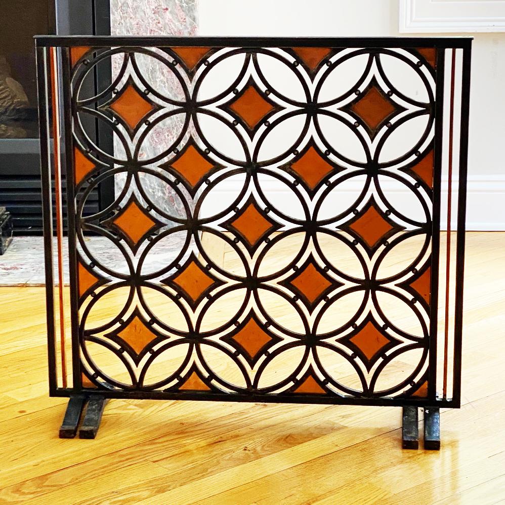 Wrought iron with brass inserts fire screen.
Looks better in reality than in the pictures.