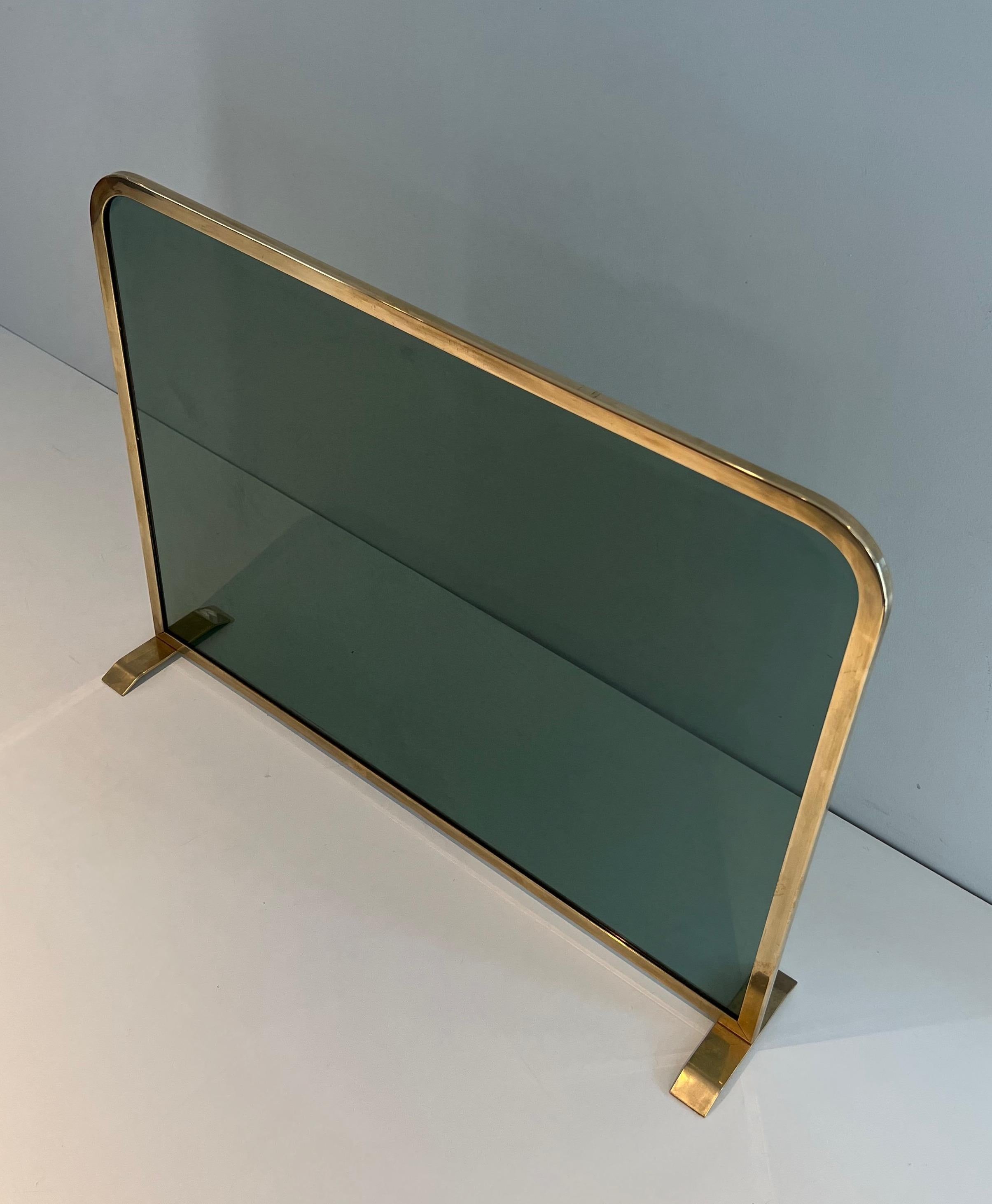 Fireplace Screen Made of a Greenish Glass Panel Surrounded by a Brass Frame For Sale 5