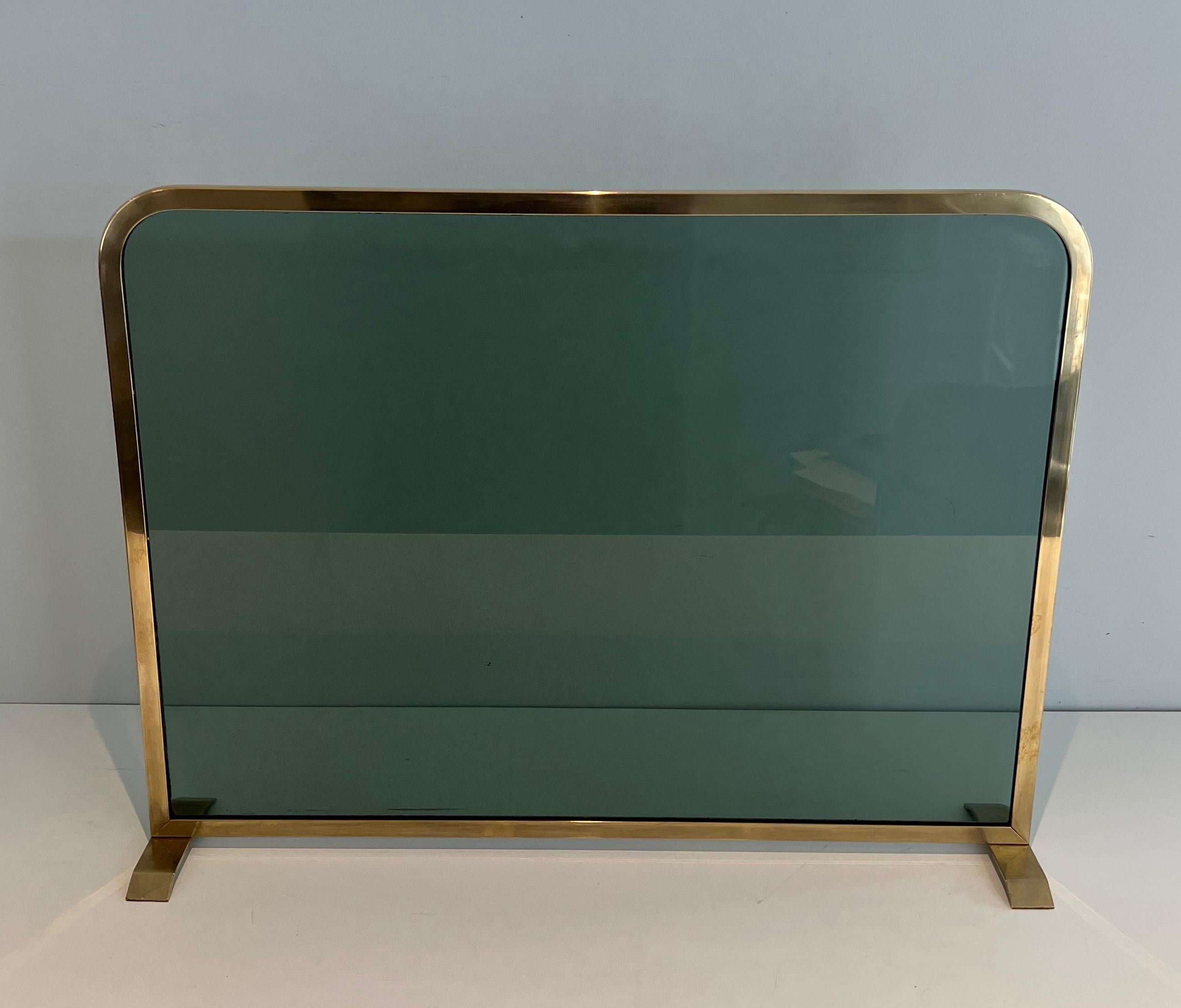 Fireplace Screen Made of a Greenish Glass Panel Surrounded by a Brass Frame For Sale 6
