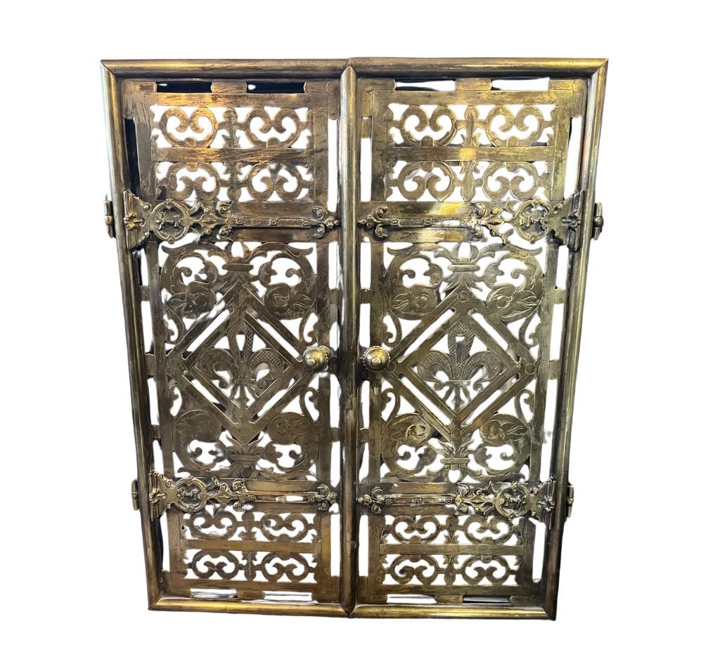 brass fireplace screen with doors