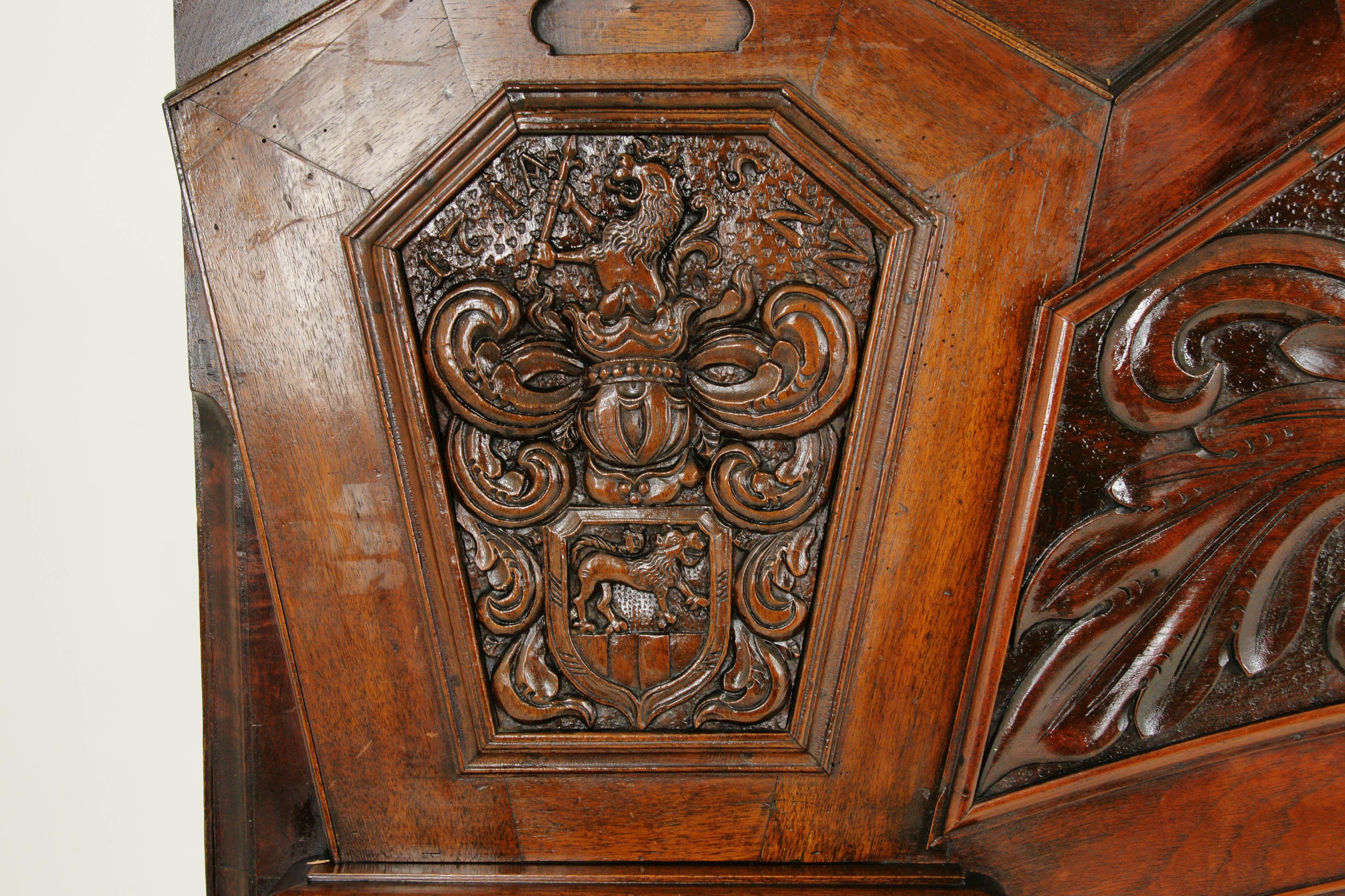 Fireplace surround, fireplace mantle, carved walnut mantle, Scotland 1920, Antique Furniture, B1522

Scotland, 1920
Carved walnut
Original finish
Solid walnut and veneers
Floral carvings to the front with coats of arms at either end
Plain