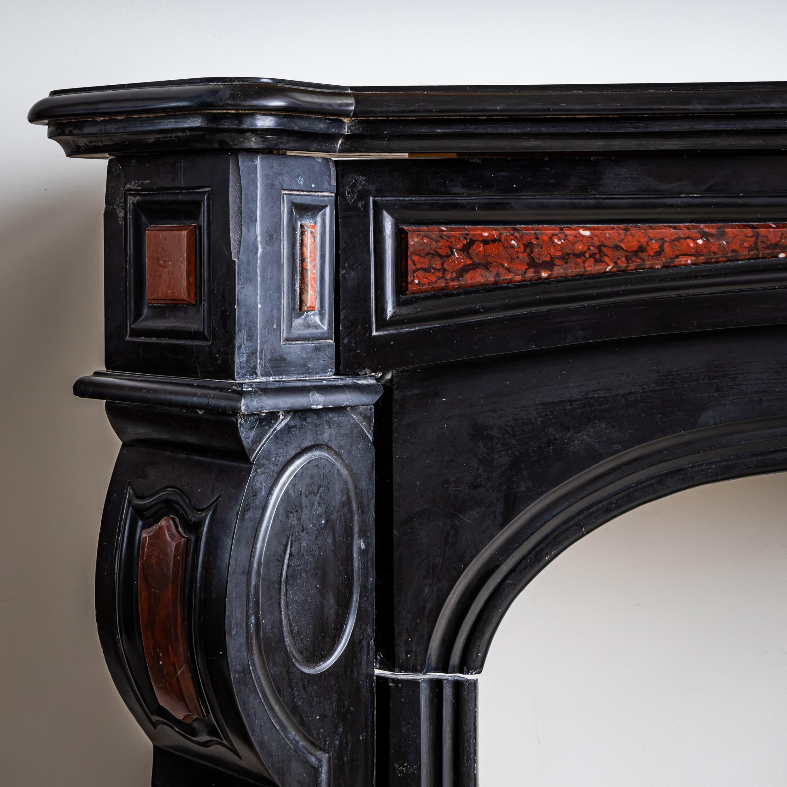 French Fireplace Surround in Black Stone, France, 19th Century For Sale
