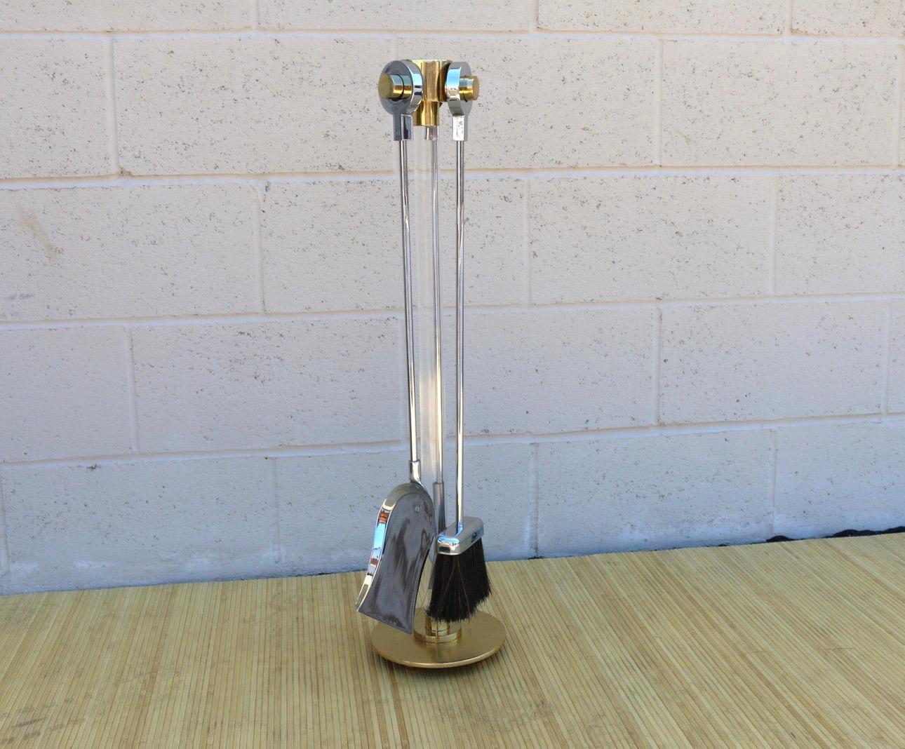 Beautiful fireplace tools three pieces set in the Danny Alessandro style. Made of brass, chrome, steel, and lucite. It is in original vintage condition. It has some scratches in the brass base, ( check photos). No broken or missing parts. Very good