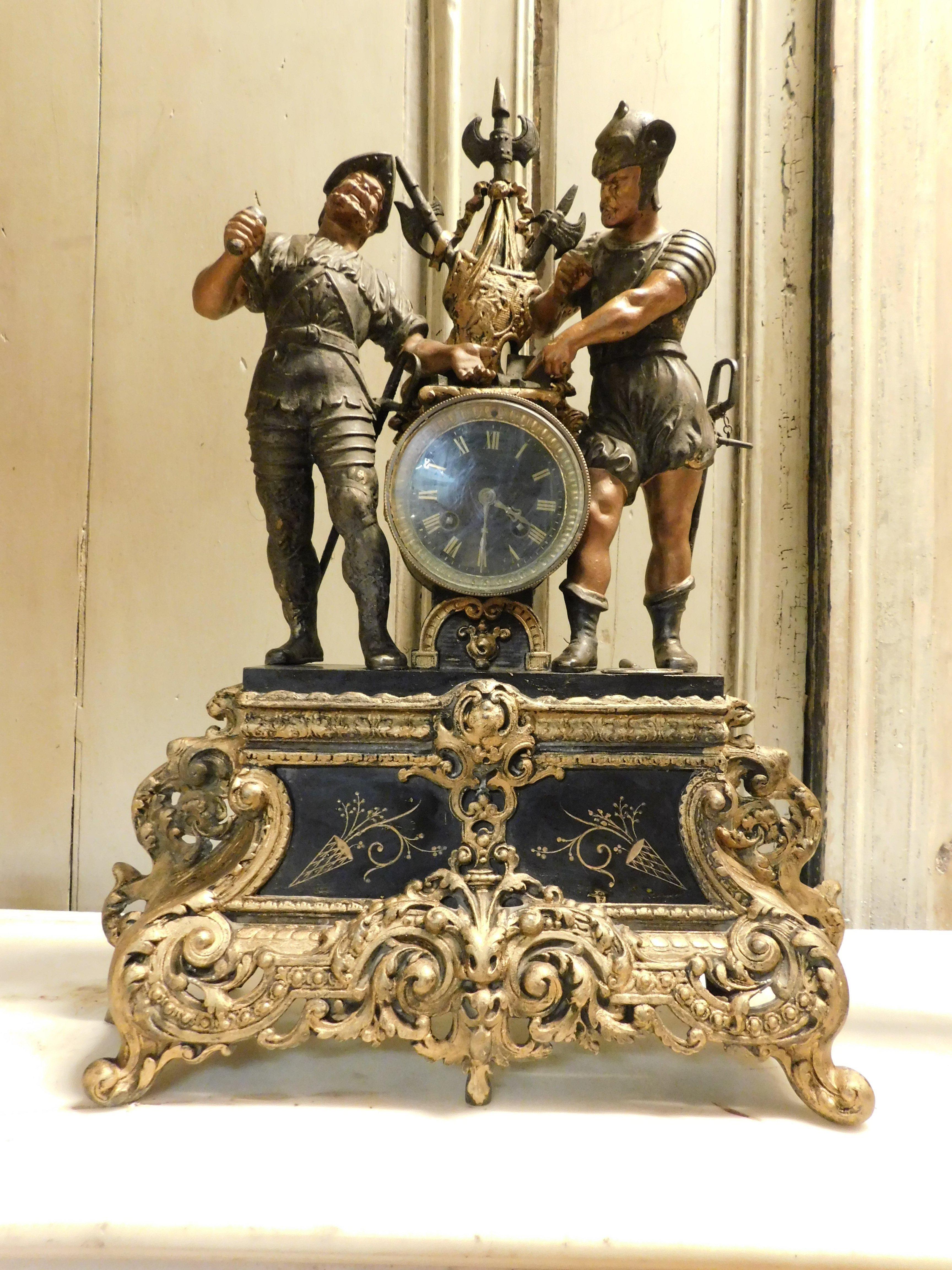 Carved fireplace triptych in bronze formed by clock and 2 candlesticks, Italy For Sale