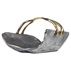 firewood holder by David Marshall, 1980s